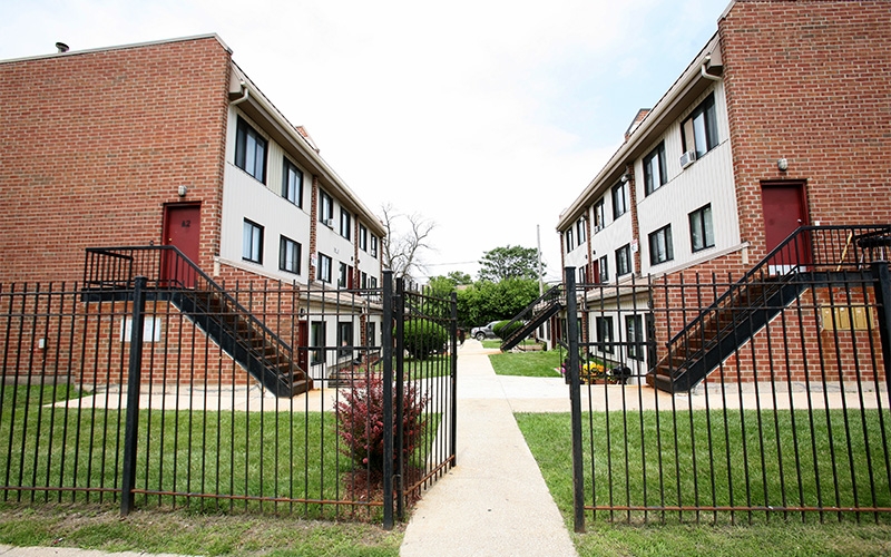 Lafayette Terrace Apartments fence and townhouses