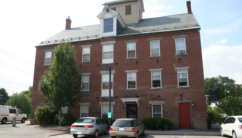 Sugar River Mills exterior and parking lot