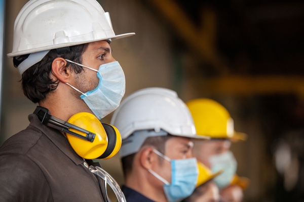 Construction workers wearing protective gear