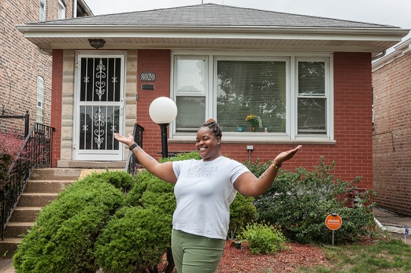 Dawn in front of her home