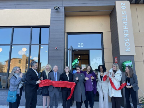 residents cut the ribbon at 20 Stephenson Aman Apartments