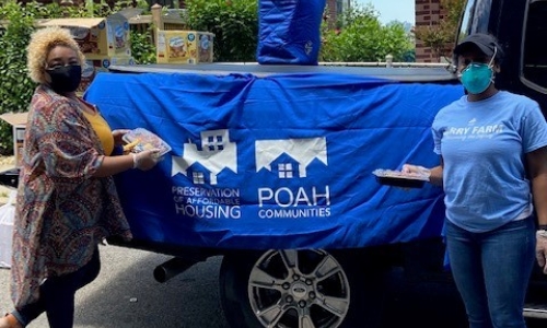 staff giving out meals
