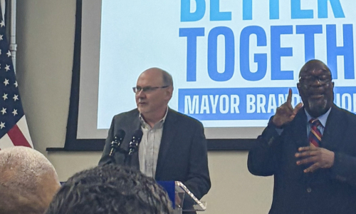 Bill Eager speaking at Press Conference