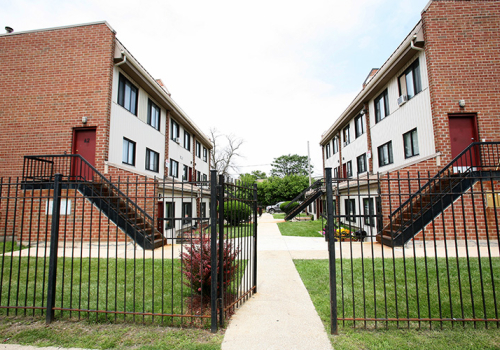 Lafayette Terrace Apartments fence and townhouses