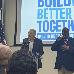 Bill Eager speaking at Press Conference